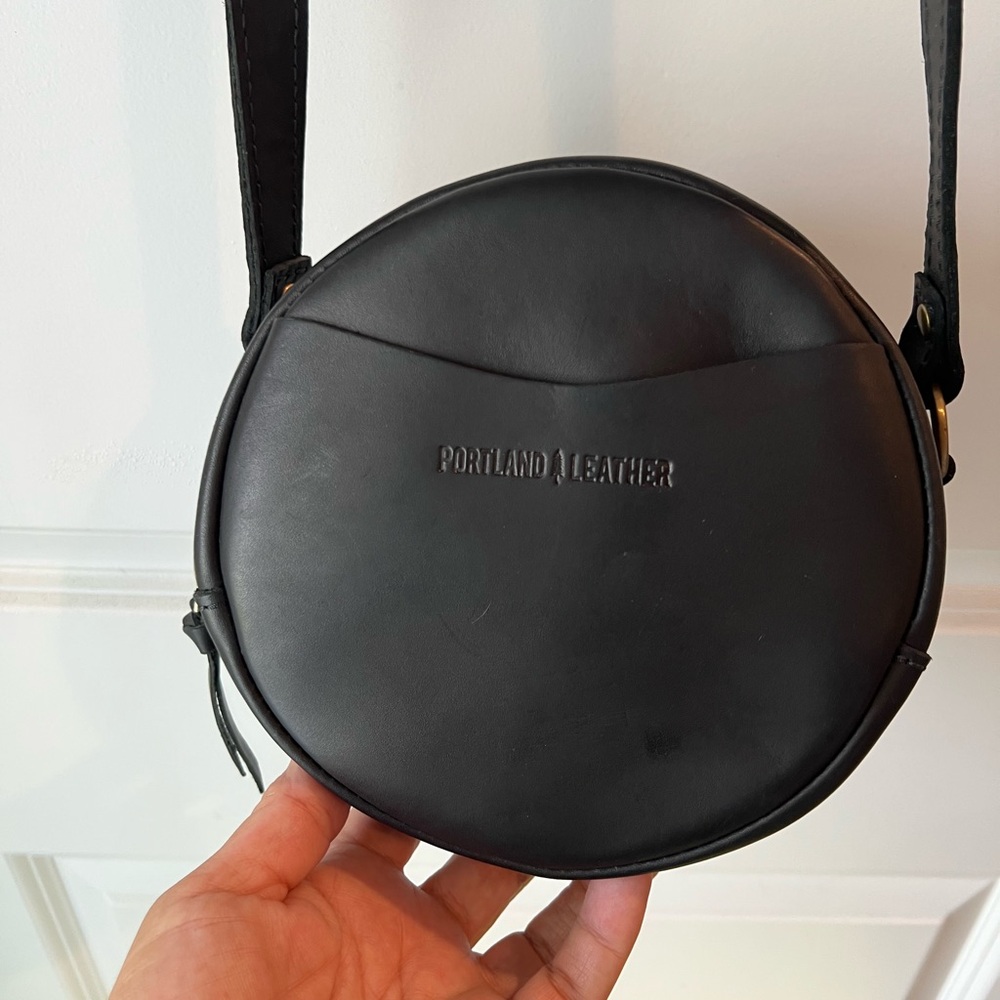Portland Leather round black Crossbody Bag